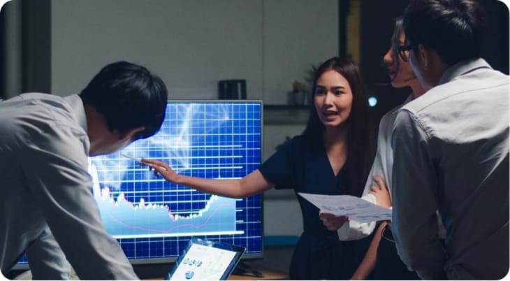 Team analyzing unified data for global pharmaceutical reliability.