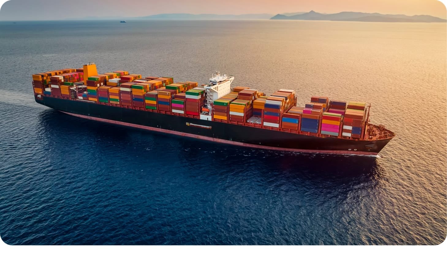 Cargo ship representing digital transformation in global maritime compliance.
