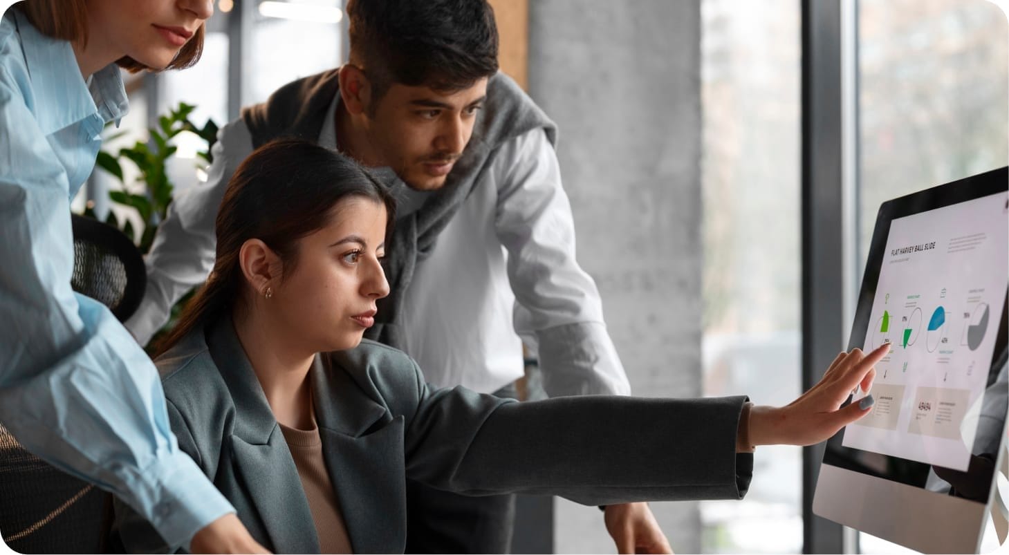 Team reviewing transport data analytics for cloud-based resilience.